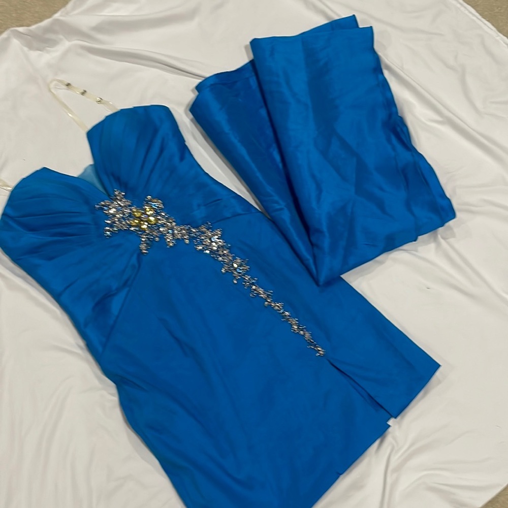 Beautiful bejeweled address. Can be worn strapless or with straps. With shawl.